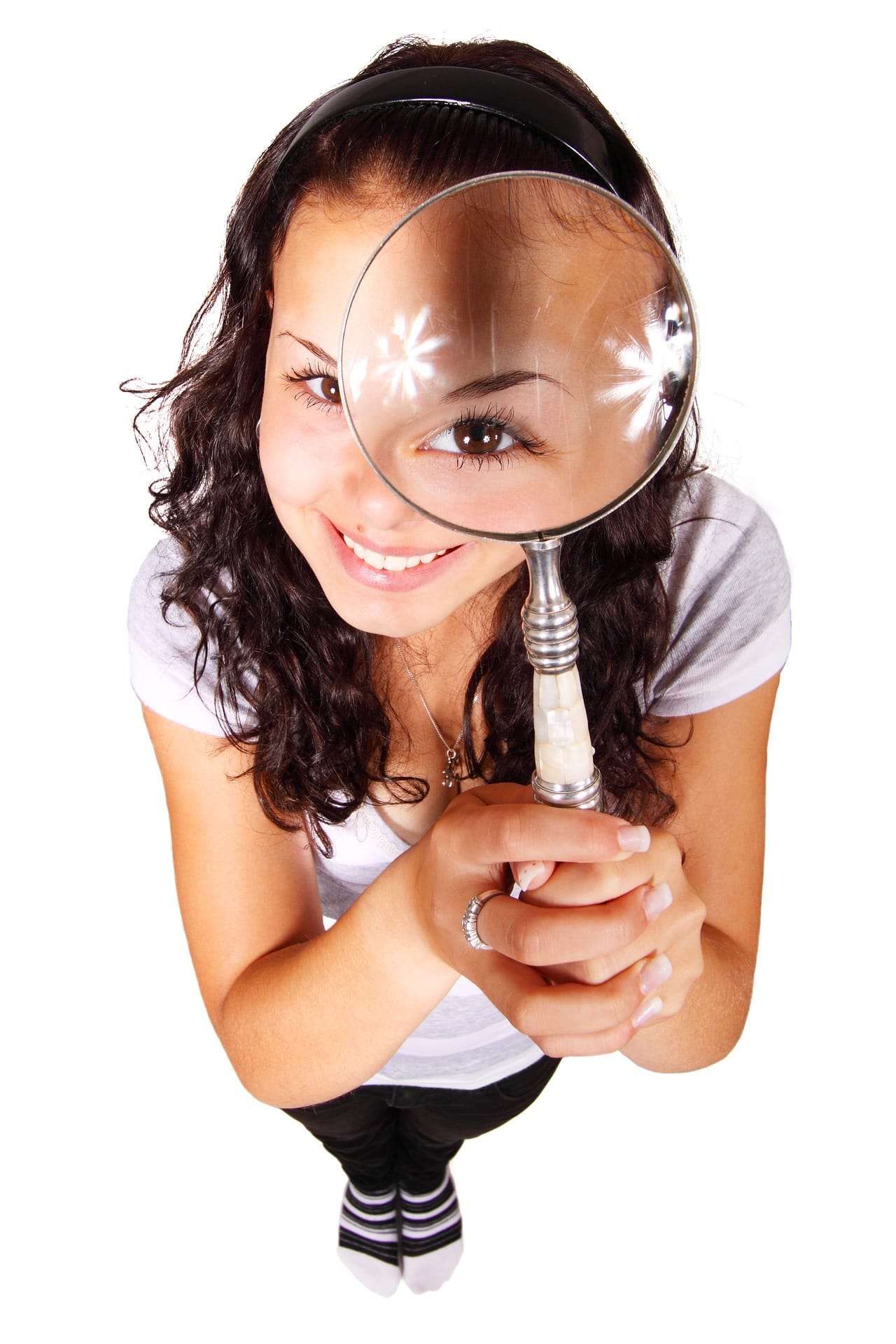 Image of a girl and magnifying lens, for article title: What's in a name? Your domain name and email address are EVERYTHING.